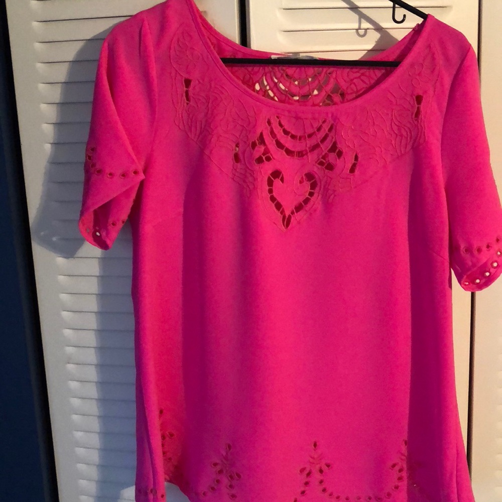 Tunic with cut outs